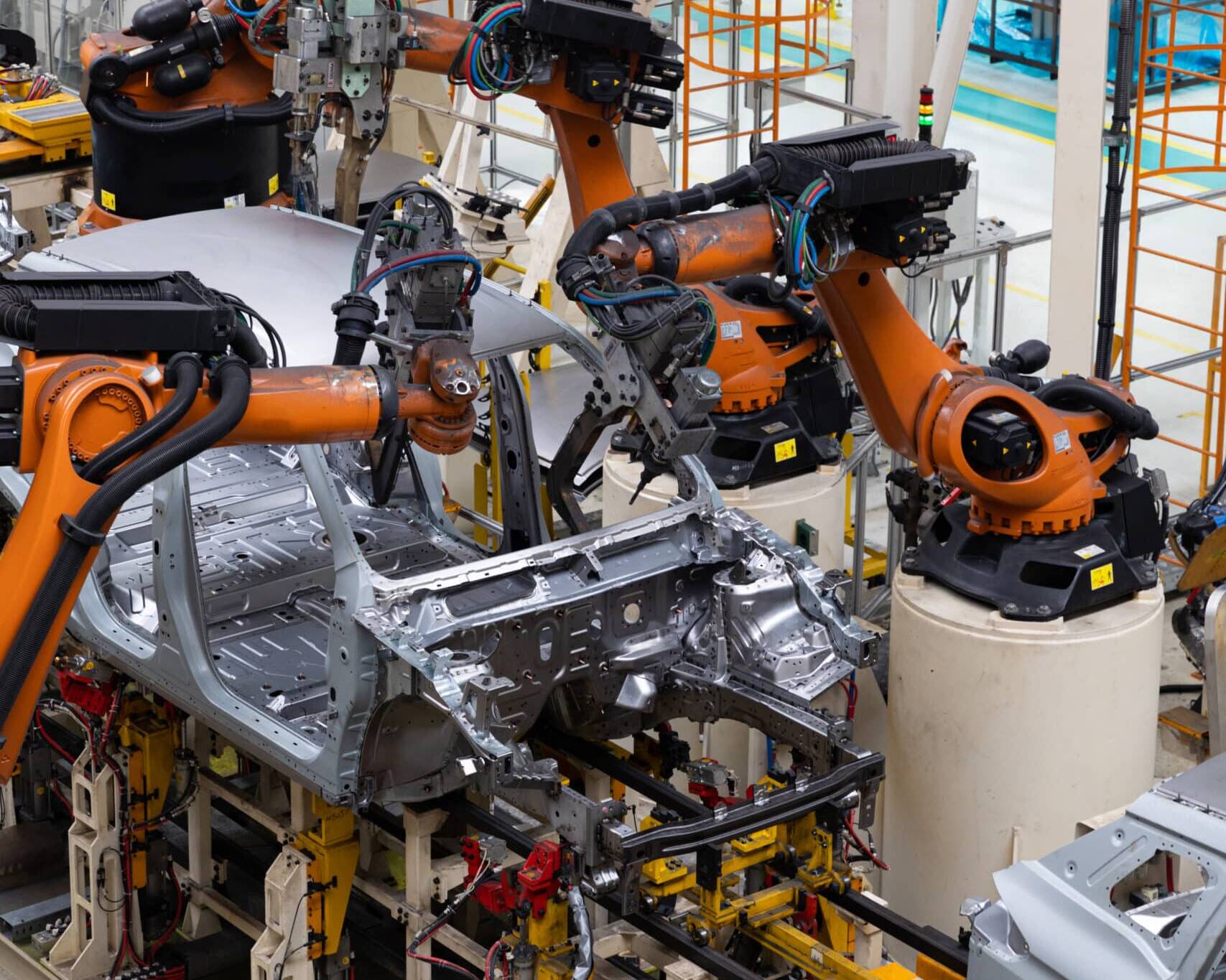 Industrial robot cell illustrates the need for precise localization for AGVs, mobile robots and automated equipment.